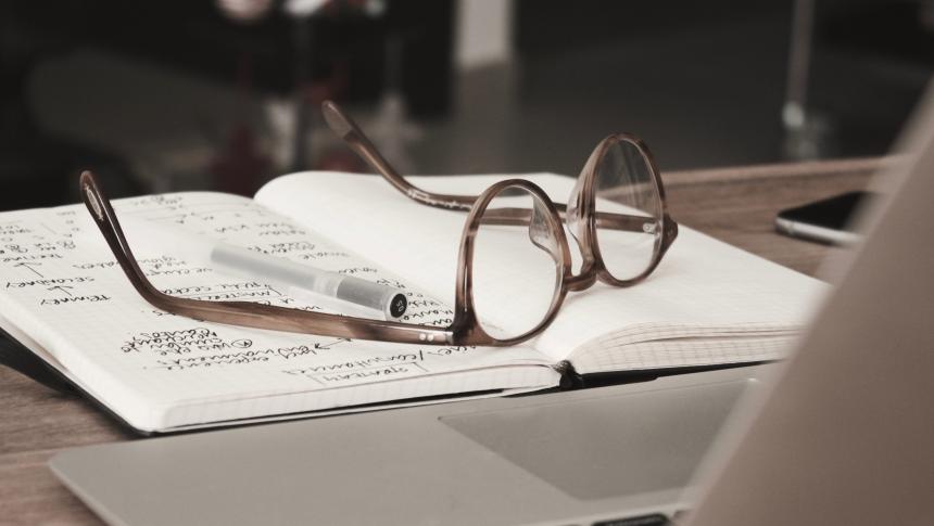 Laptop, notebook and glasses