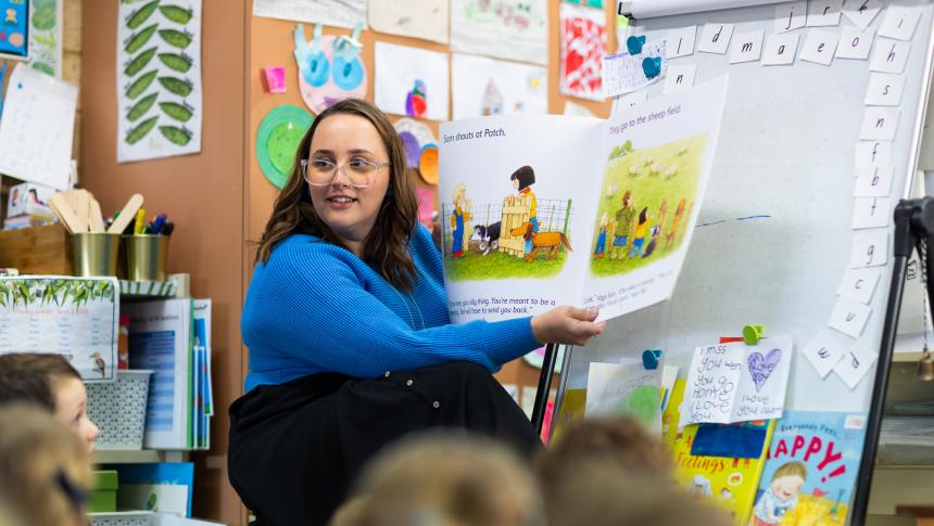 Teacher reading a big book to a class
